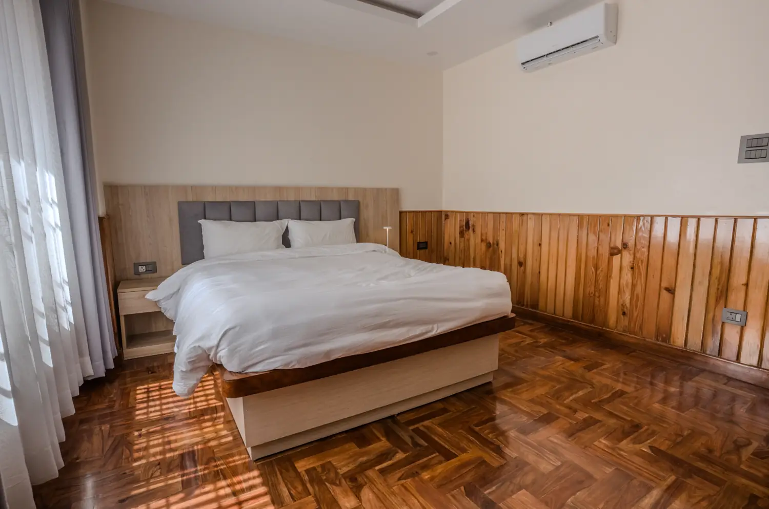 Bedroom with morning sun across the floor